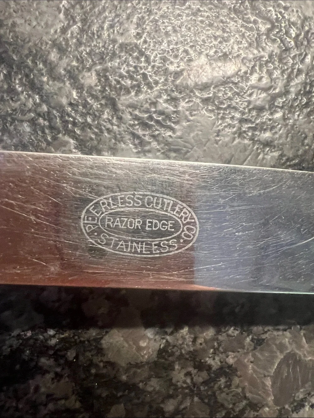Vintage Set of 14 Peerless stainless Blue-Handled Table Knives. Iridescent